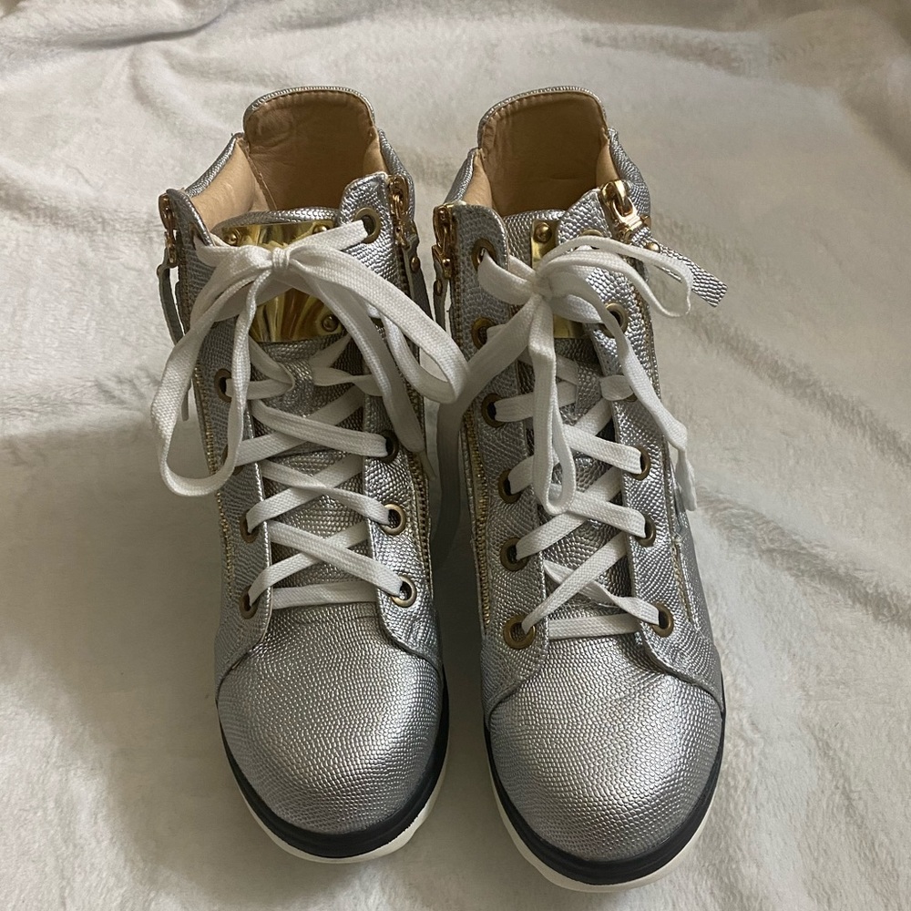 Shiny silver metallic sneaker.